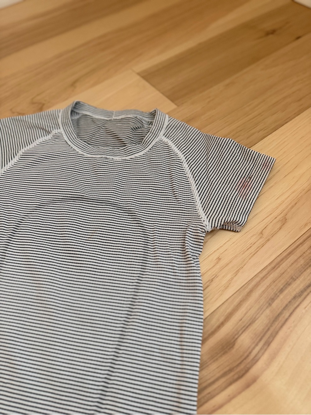 Women’s Black & White Thin-Stripe Crew Neck workout shirt.